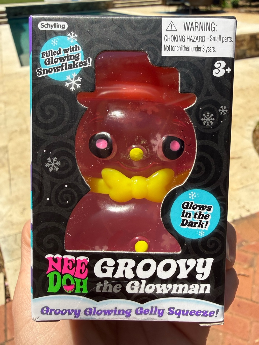 NeeDoh Groovy the Glowman - Pink with glowing snowflakes. Christmas 2024 edition